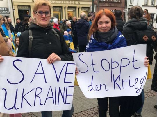 Про роковини російського вторгнення мешканцям Німеччини нагадали портретами вбитих українців (фото)